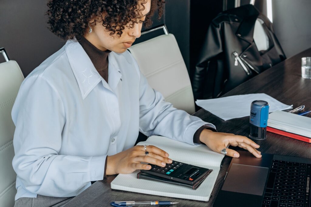 Young woman in office preparing for an audit